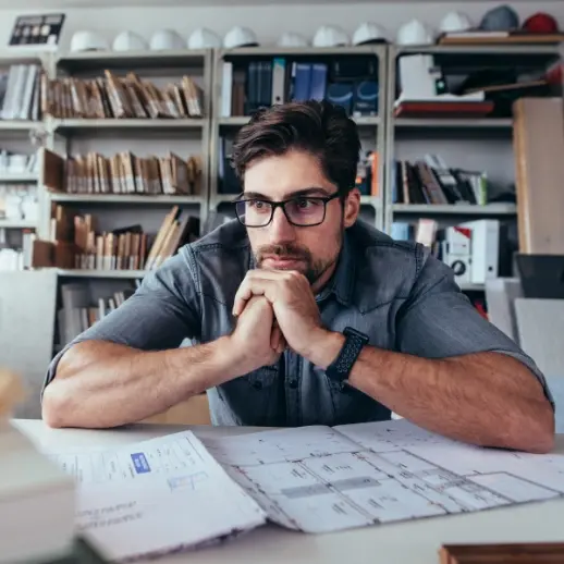 man sitting at desk