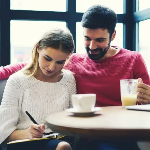 couple taking notes