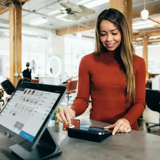 Woman using credit card