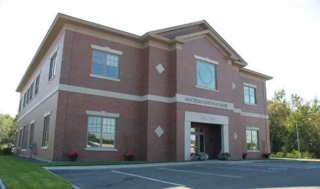 a two-story Machias bank building, located in Brewer