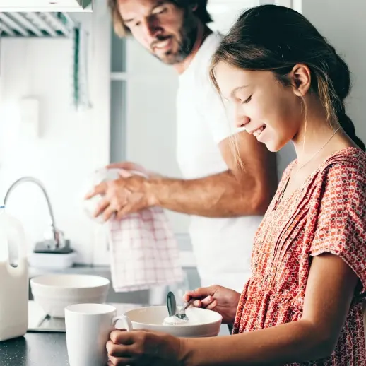 father and daughter in the kitchen