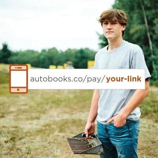 Young boy holding a blueberry take with a payment link.