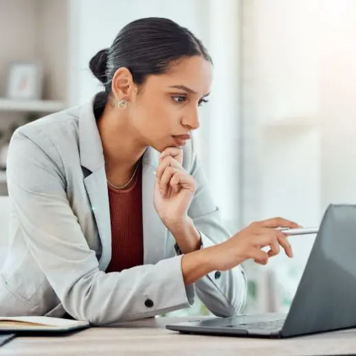 Woman looking at computer.